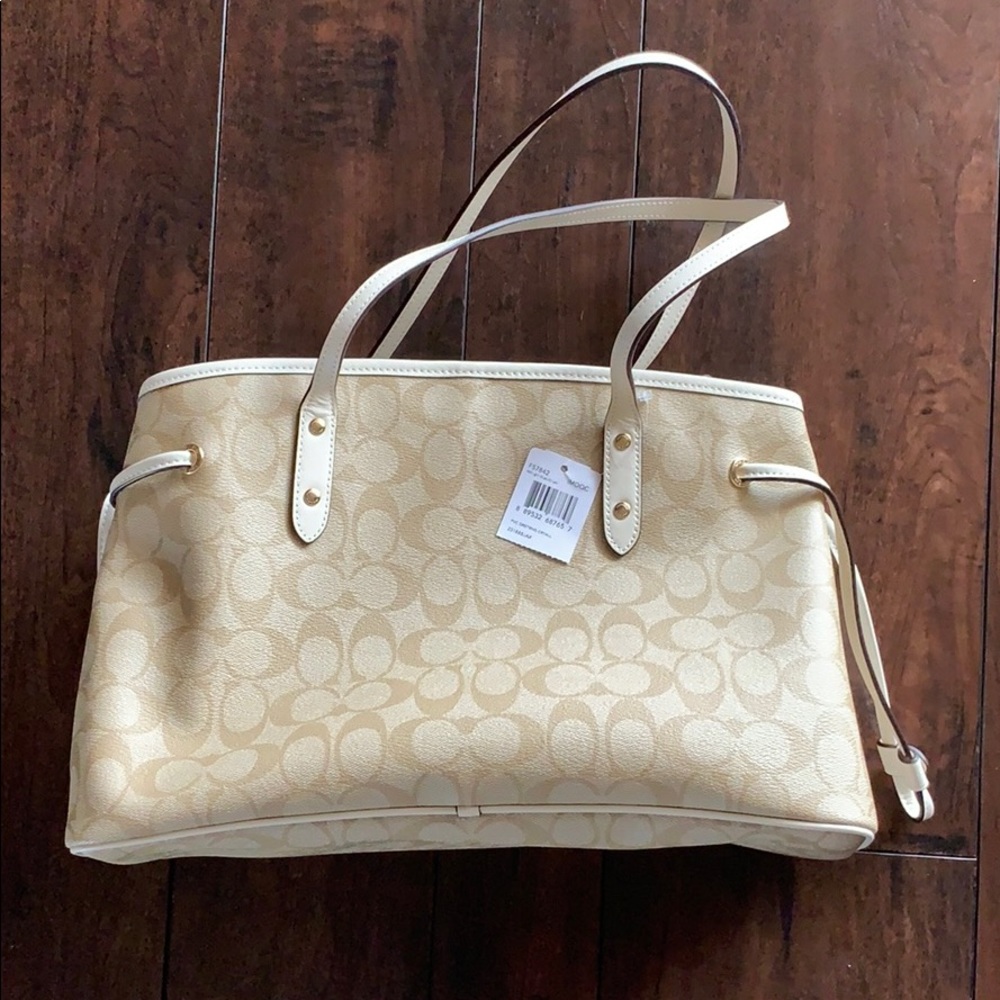 Authentic NWT Coach carryall purse. Khaki/white